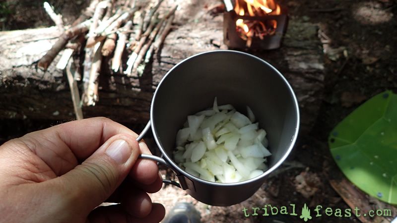 Sauteing onion and garlic in a TOAKS 750ml titanium pot.